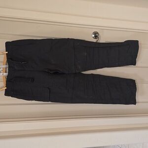 North Face convertible hiking pants. Men's size Mlong, forest brown color.